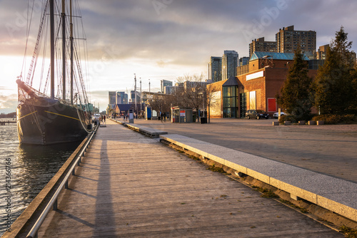 Photography Boardwalk on Toronto Waterfront Lit by an Autumnal Setting Sun