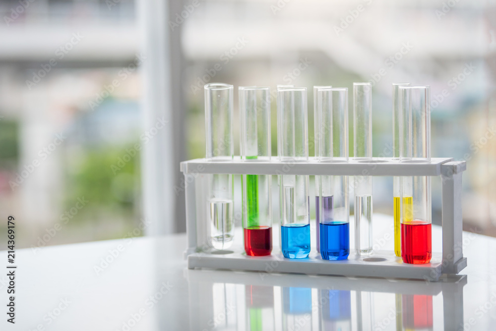 Test tubes with colorful chemical on table. Science chemistry concept.