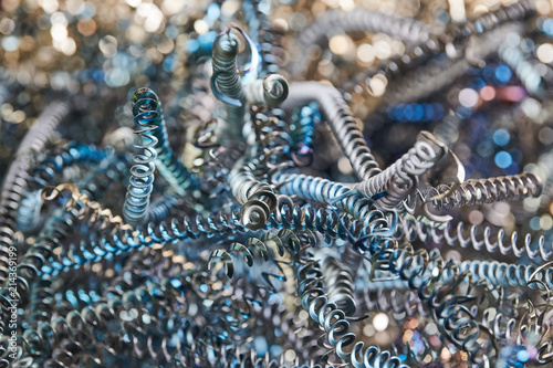 Fotografie Scrap metal spiral shavings after metalwork