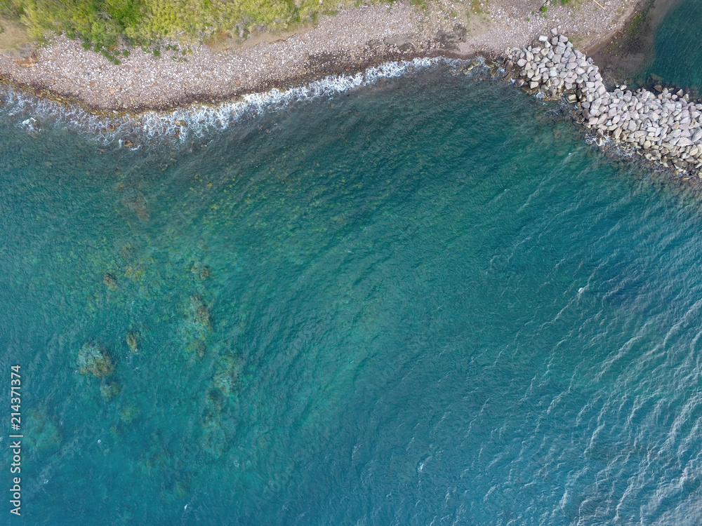 Aerial view of jetty protecting beach in Saint Kitts and Nevis
