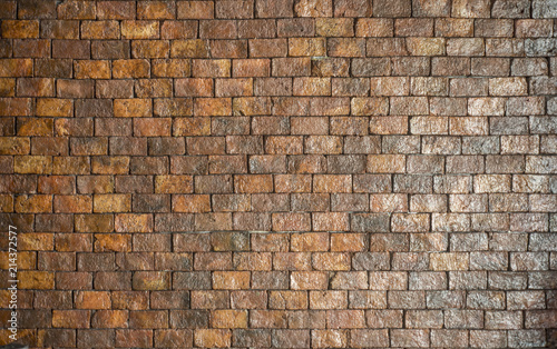 textured decorative orange brick wall. background