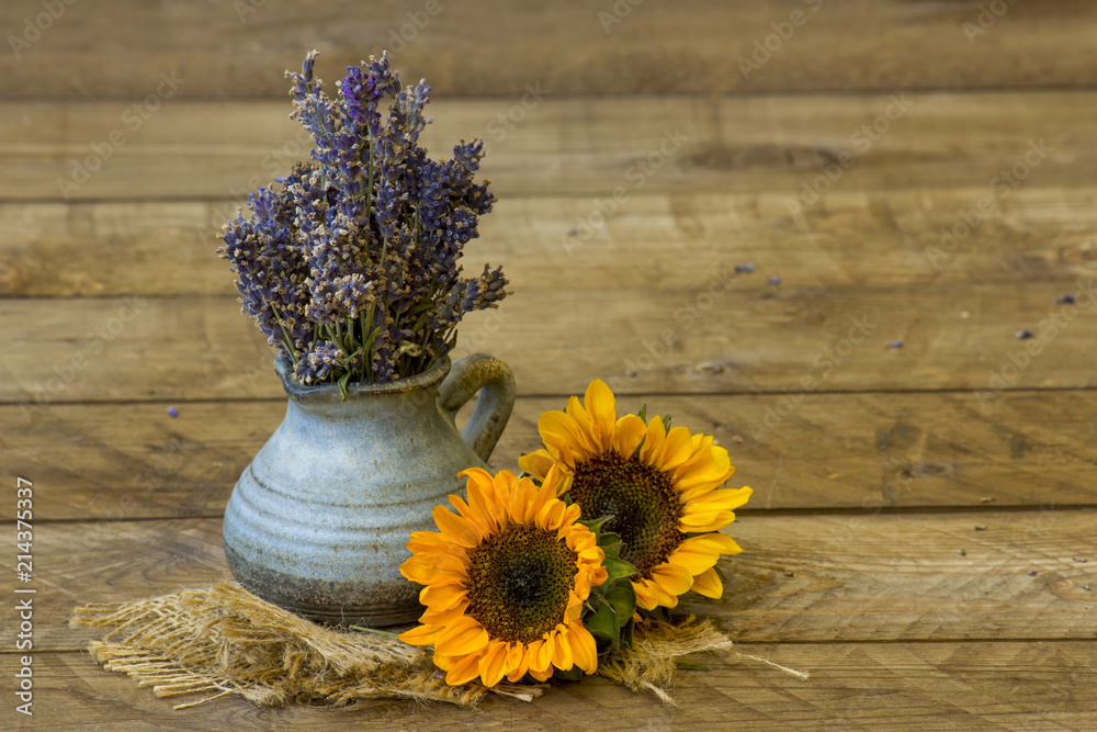 Fototapeta premium sunflowers and lavender in a vase