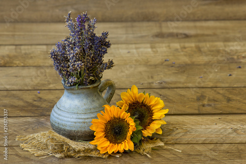 Fototapeta Naklejka Na Ścianę i Meble -  sunflowers and lavender in a vase