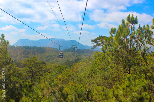 cable-way over the forest on a sunny day in the city of Da Lat, Vietnam