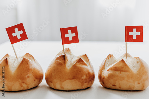 Traditional swiss bread buns called in German 1.Augustweggen baked in Switzerland to celebrate Swiss National Day on August 1st. The top of the bread being cut crosswise to shape a cross.