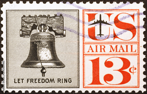 Liberty bell on old american postage stamp photo