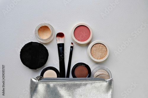 cosmetics and brushes on the white backgroung photo