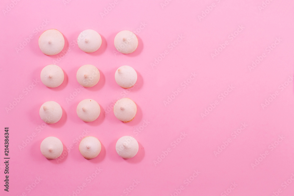 Zephyr biscuits on a light pink-red background. Zephyr biscuits on a light pink-red background.