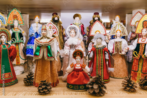 Russian souvenirs handmade doll in the traditional dress and hen