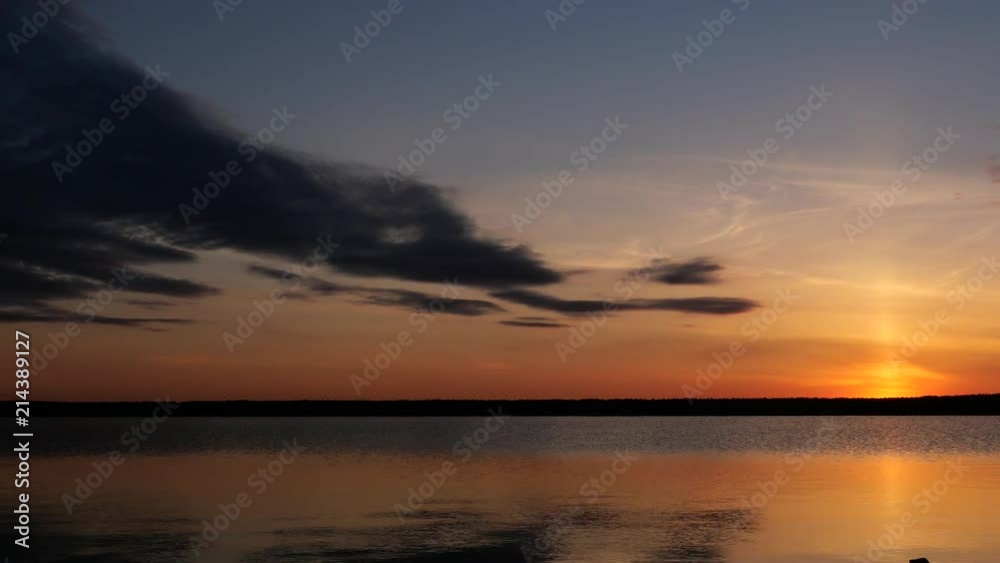 Golden sunset over tranquil lake Golden sunset over tranquil lake