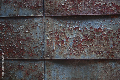 old iron background with peeling paint
