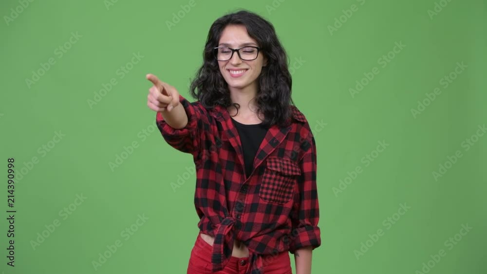 Young beautiful businesswoman pointing finger Young beautiful businesswoman pointing finger
