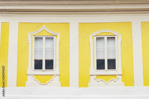 Vintage window on color cem...