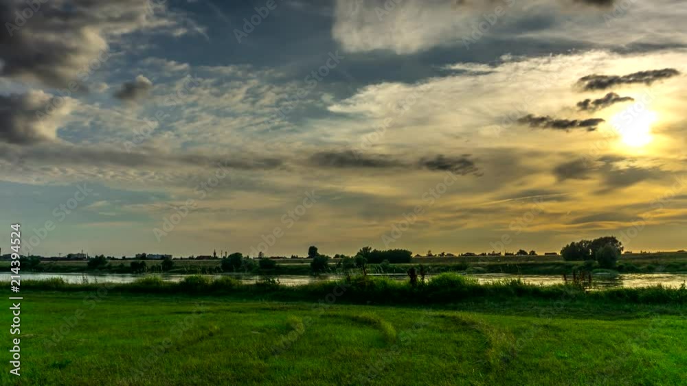 Clouds flowing in the sky at sunset over the Vistula. Clouds flowing in the sky at sunset over the Vistula.