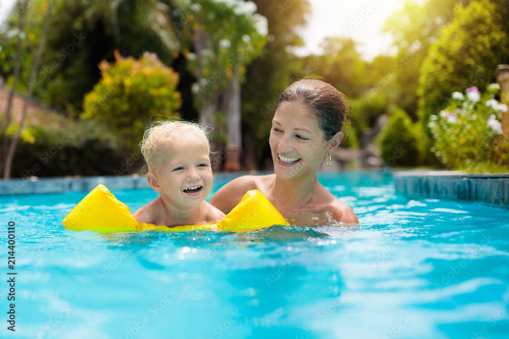Mother and baby in swimming pool Mother and baby in swimming pool