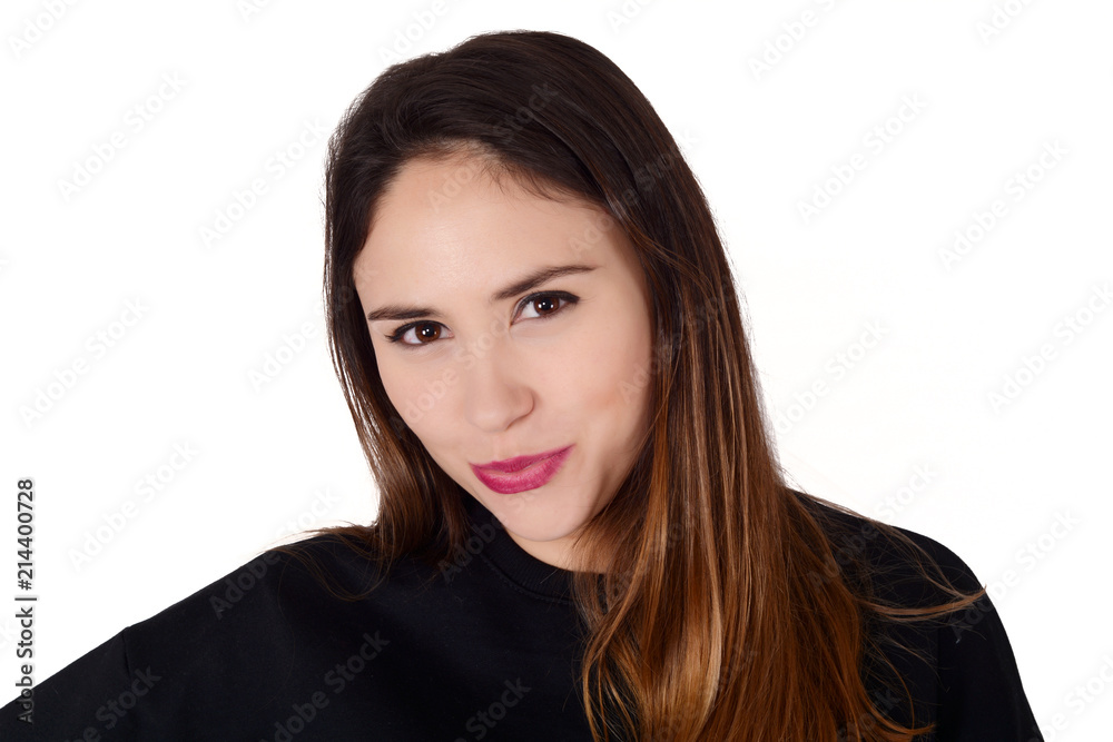 Portrait of young latin woman in a studio. Portrait of young latin woman in a studio.
