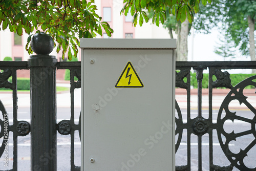 Obraz na płótnie Switchboard high voltage on a street. Sign of lightning on the shield. w salonie