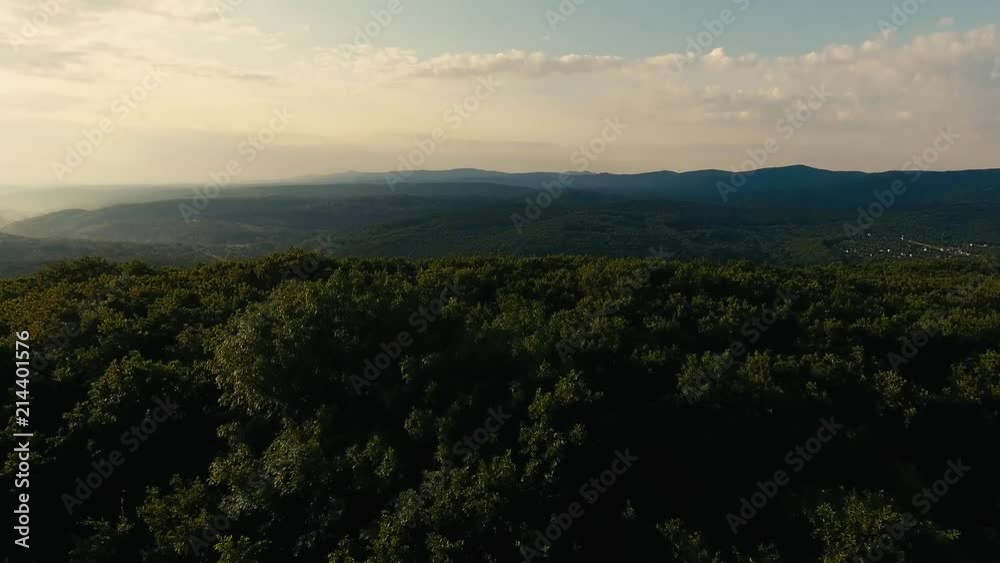 A long and slow aerial helicopter shot of beautiful green mountain ridges A long and slow aerial helicopter shot of beautiful green mountain ridges