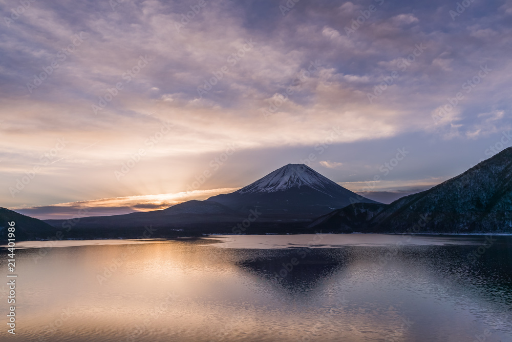 Lake Motosu and Mount Fuji at early morning in winter season. Lake Motosu is the westernmost of the Fuji Five Lakes and located in southern Yamanashi Prefecture near Mount Fuji, Japan Lake Motosu and Mount Fuji at early morning in winter season. Lake Motosu is the westernmost of the Fuji Five Lakes and located in southern Yamanashi Prefecture near Mount Fuji, Japan
