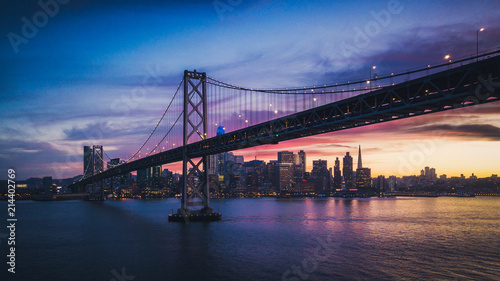 Aerial Cityscape view of San Francisco and the Bay Bridge with Colorful Sunset
