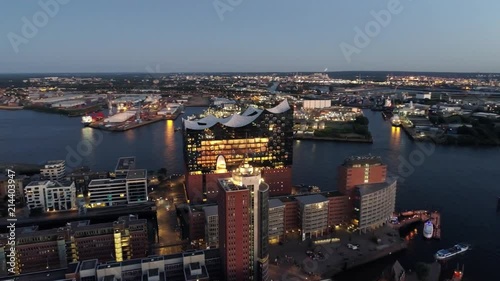 Aerial View of Elbphilharmonie and HafenCity at sunset, Hamburg, Hanseatic City. City lit up at night, Hamburg, Germany Night city landscape. Amazing architecture.