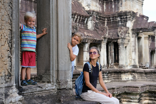 Wallpaper Mural Happy tourists family, mother and two children in Angkor temple site, Cambodia. Concept travel, discovery, family Torontodigital.ca