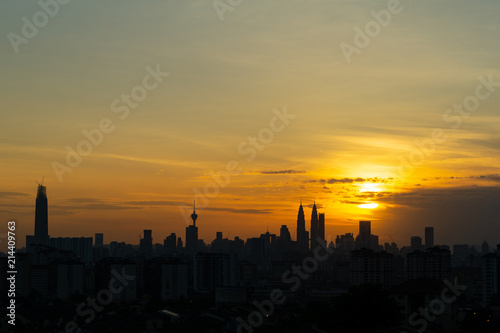 Majestic sunset over KL Tower and surrounded buildings in downtown Kuala Lumpur, Malaysia. 