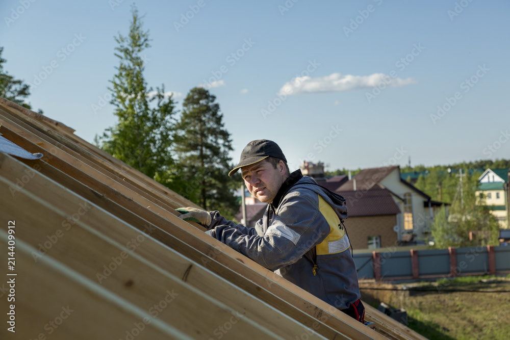 The builder on the roof The builder on the roof