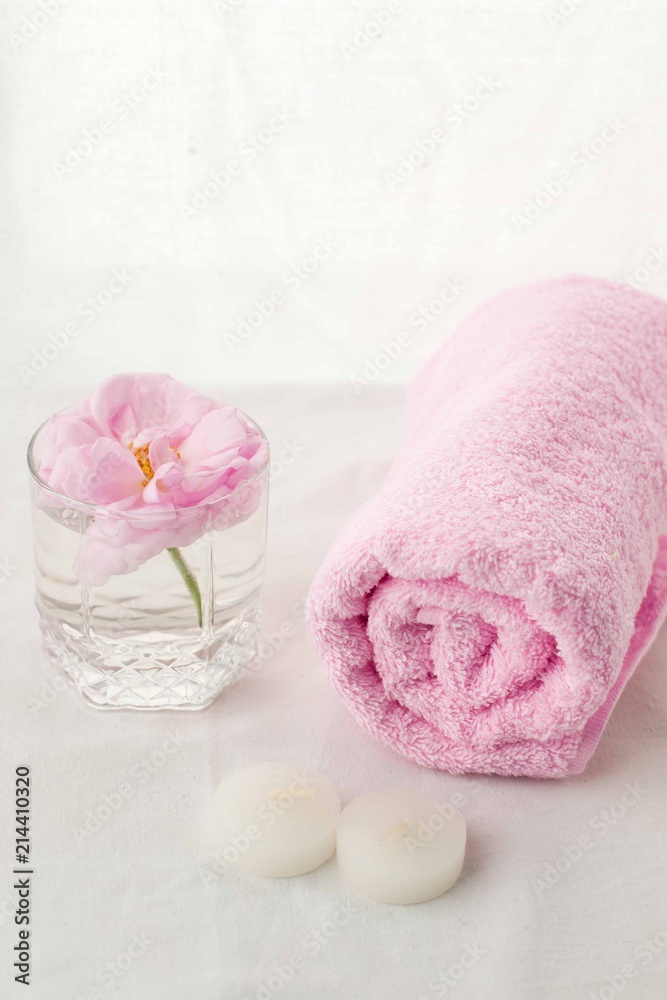 Beautiful composition of spa treatment on white tissue background, monochrome pastel concept Beautiful composition of spa treatment on white tissue background, monochrome pastel concept