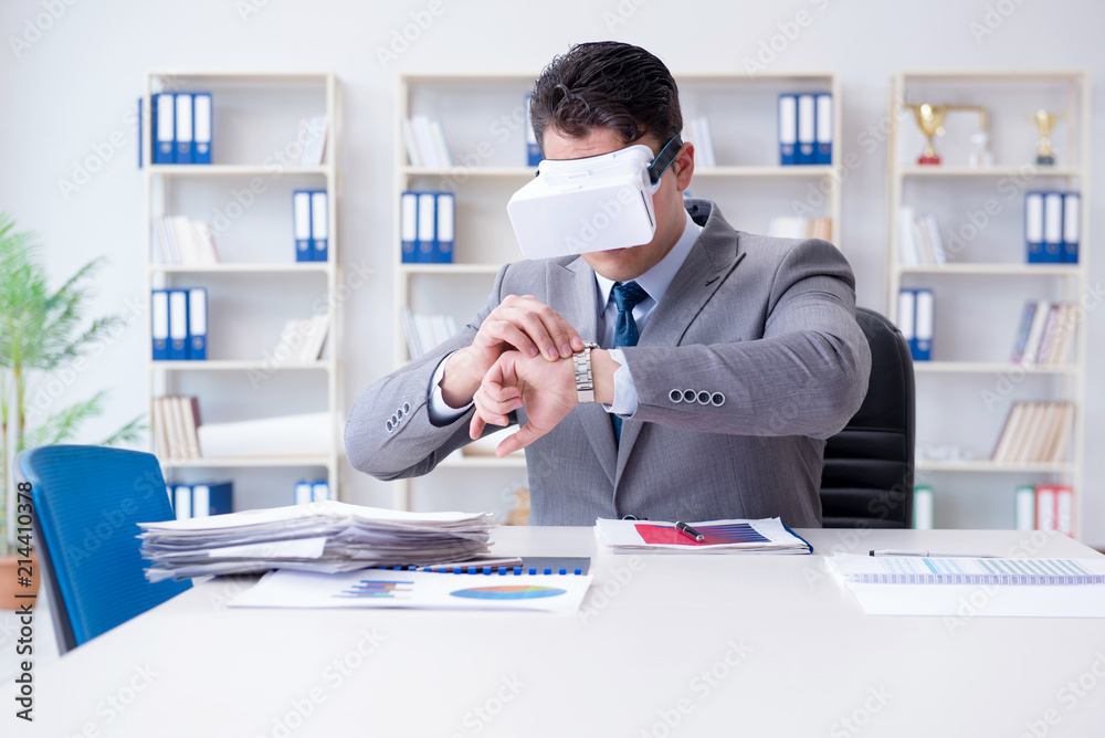 Businessman with virtual reality glasses in the office Businessman with virtual reality glasses in the office