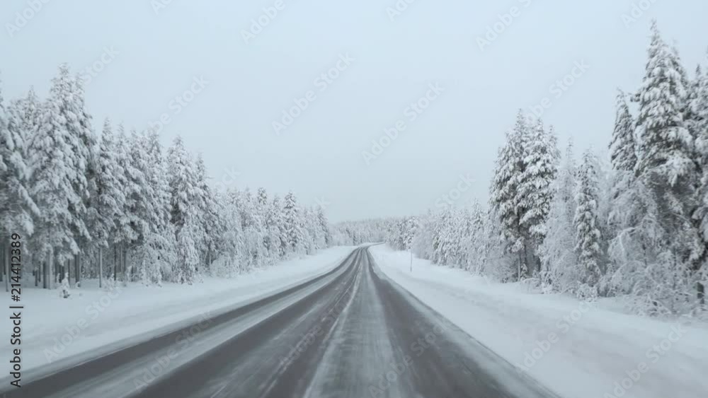Driving through winter wonderland. Lapland, Finland. Driving through winter wonderland. Lapland, Finland.