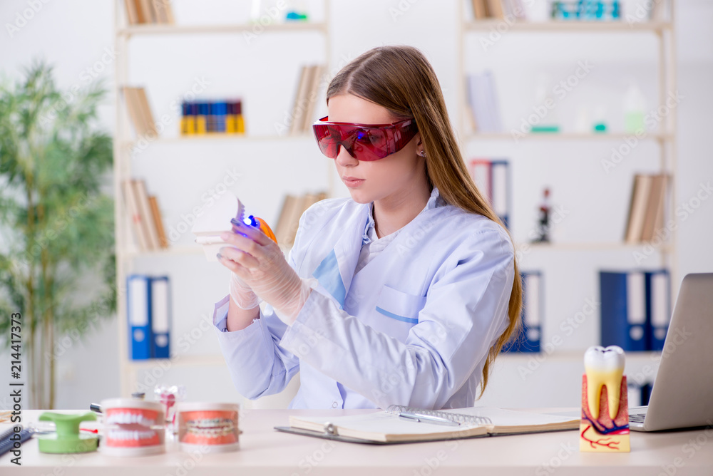 Dentistry student practicing skills in classroom Dentistry student practicing skills in classroom