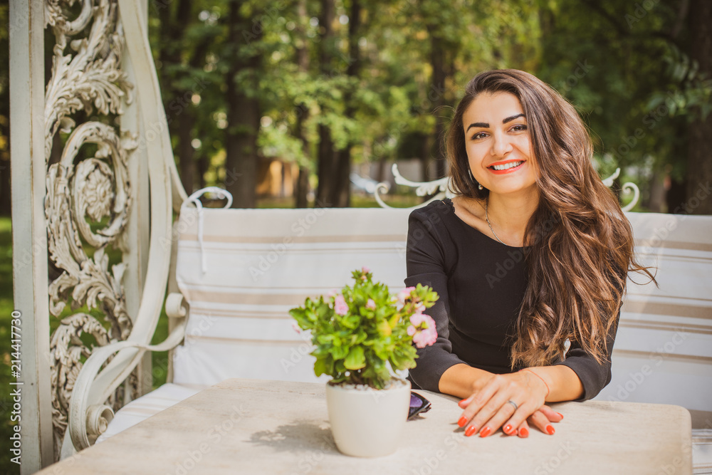 Arab woman smiling celebrating enjoying freedom. Positive emotion face expression life perception success, peace of mind concept. Free happy girl Arab woman smiling celebrating enjoying freedom. Positive emotion face expression life perception success, peace of mind concept. Free happy girl