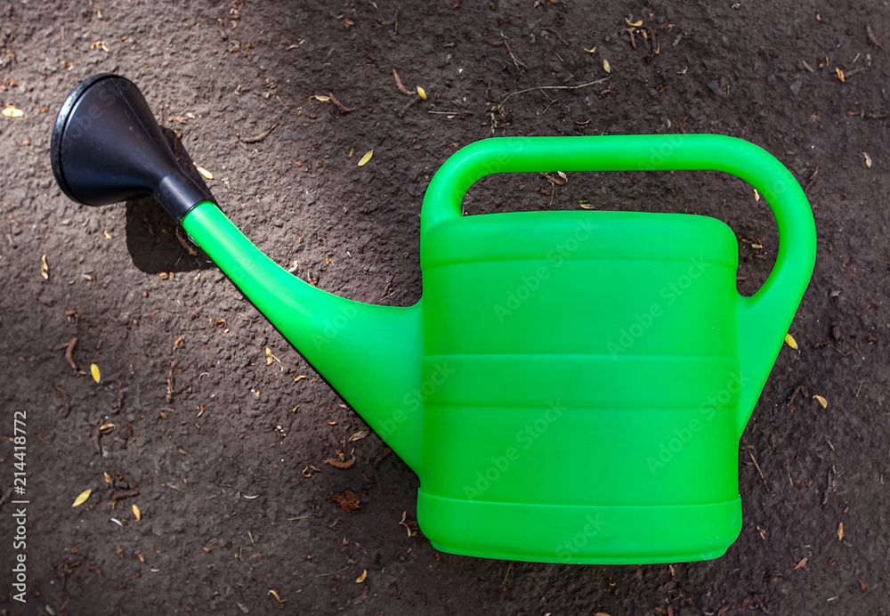 green watering can for watering flowers green watering can for watering flowers