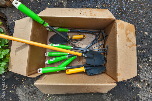 garden tool in cardboard box top view