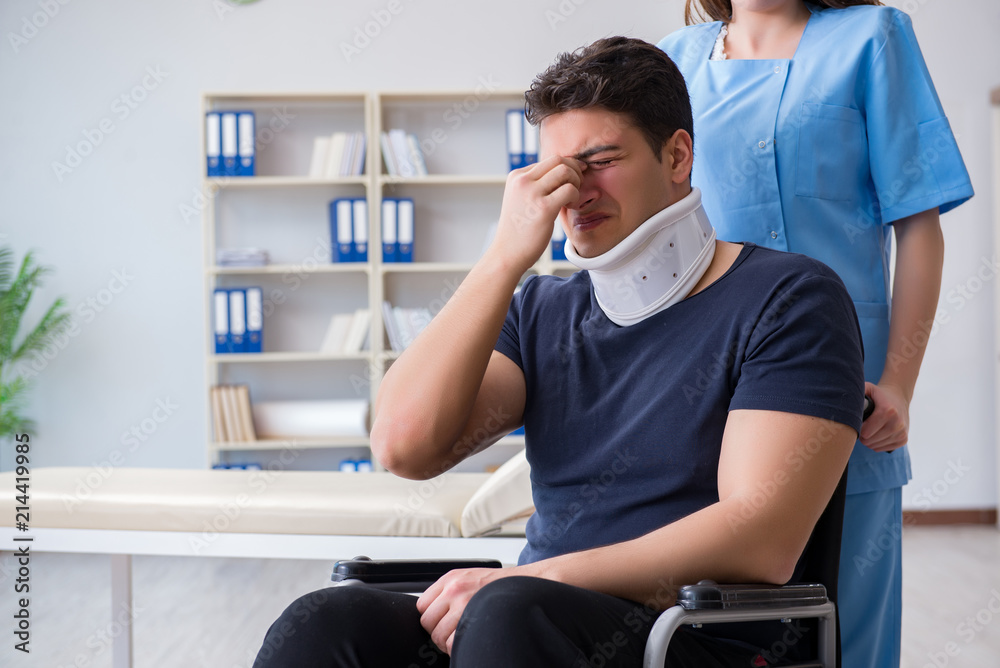 Man with neck injury visiting doctor for check-up Man with neck injury visiting doctor for check-up
