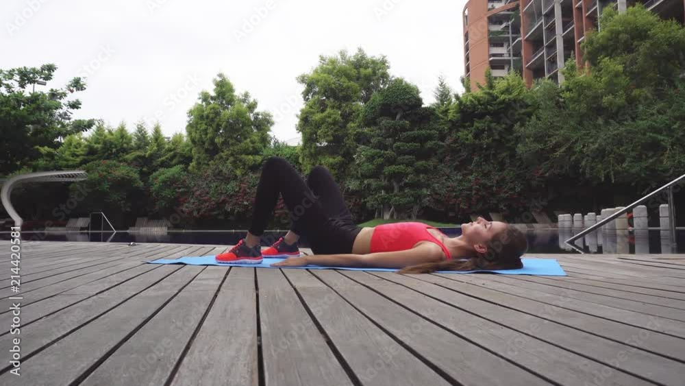 Woman doing exercises outdoors.