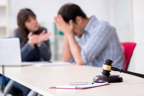 Female lawyer meeting with his male client in the office