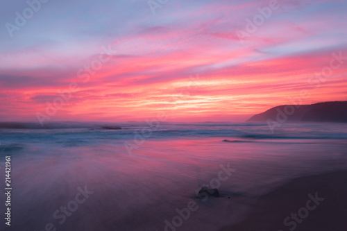 Sunset at an Australian beach alongside the iconic Great Ocean Road