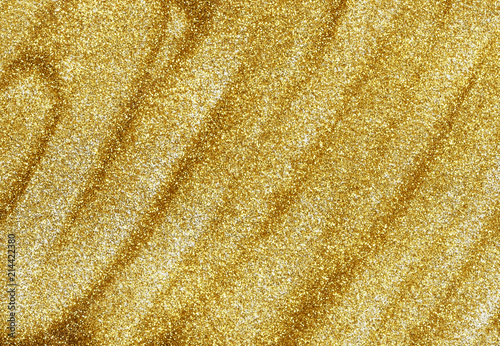 Closeup of golden glitter d...