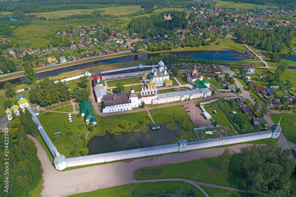 View from height on the Tikhvinsky Bogodichny Uspensky monastery in the sunny summer day. Tikhvin, Russia