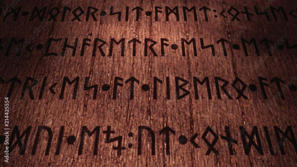 An ancient wooden tablet filled with carved runic signs, 3d panning from left to right. The text is fake, as it's the latin (public domain) Lorem Ipsum.
