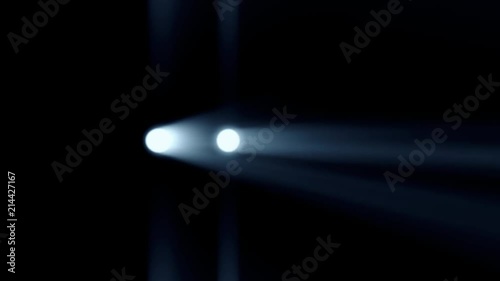 Silhouette of car with headlights on black background. Car headlights ray beam isolated. Light car