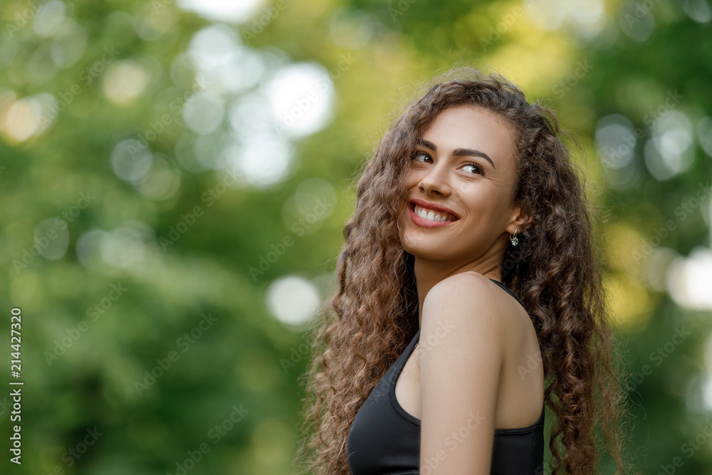 curly beautiful smiling woman curly beautiful smiling woman