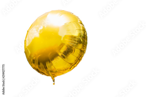 Beautiful festive gold balloon isolated on white background.