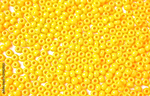 Mosaic made out of yellow beads. 