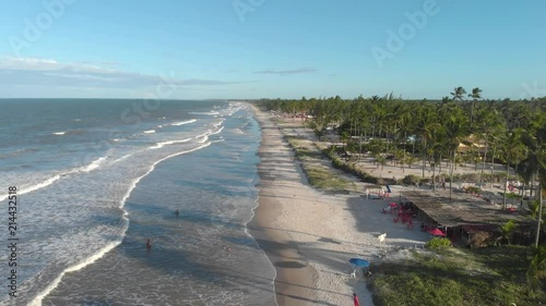 people getting into the sea. drone view. canavieiras, bahia, brazil