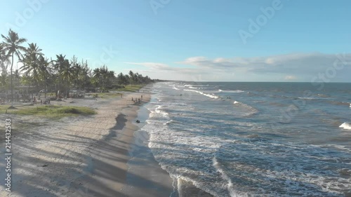 drone view of waves hitting the shore. canavieiras, bahia, brazil