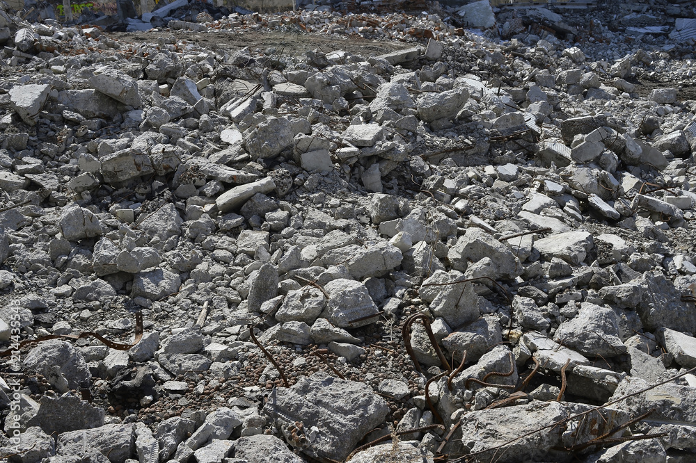 Texture in the form of scattered stones remains of a destroyed building. Background Texture in the form of scattered stones remains of a destroyed building. Background