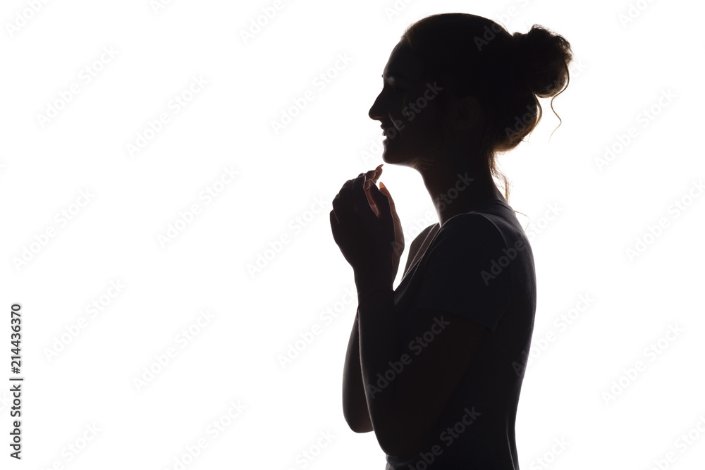 silhouette of sincere laughing girl on a white isolated background